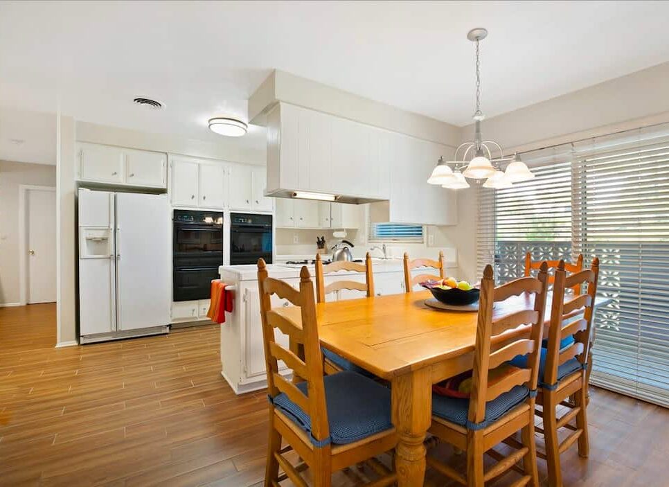 A clean living room and kitchen